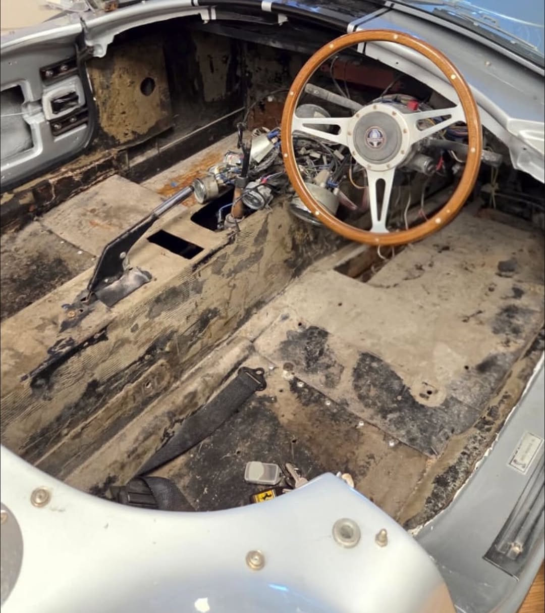 AC Cobra with the interior stripped back to a bare shell before trimming began